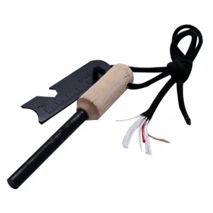 Detailed view of outdoor survival fire starter, magnesium rod with wooden handle and scraper.
