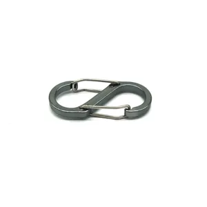 Detailed view of the dark grey aluminum alloy S-shaped carabiner, dual wire gate clip hook.