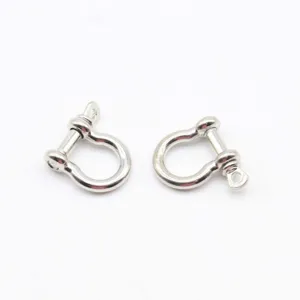 Close-up of silver metal bow shackles, ideal detail shot for paracord DIY craft accessories.