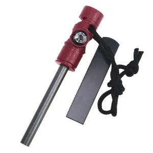 Outdoor multi-functional survival fire starter with compass and whistle, essential camping gear.