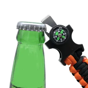 Multifunctional outdoor survival paracord buckle with integrated compass and bottle opener tool.