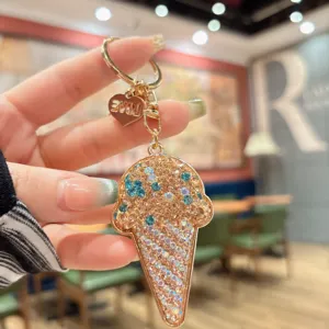 Detailed view of rhinestone ice cream keychain handbag charm sparkling crystal key ring accessory