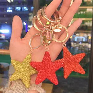 Portachiavi con stella in strass lucido e anelli dorati, ciondolo scintillante per chiavi auto.
