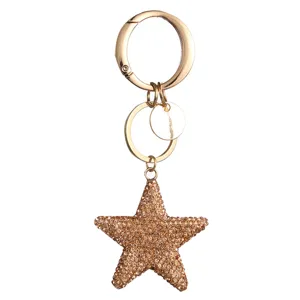 Portachiavi stella strass brillante metallo dorato anello elegante ciondolo borsa chic