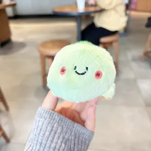 Cute green plush toy keychain pendant, soft stuffed doll for backpack decoration and gifts.