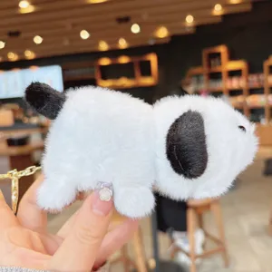 Cute plush capybara keychain pendant, soft fluffy animal bag charm accessory for daily use.