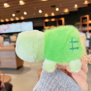 Cute green plush toy keychain pendant, soft stuffed animal bag charm for gifts and daily use.