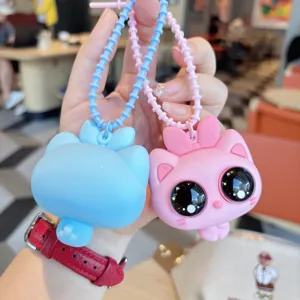 Carino portachiavi gatto grandi occhi in silicone ciondolo borsa decompressione con bel fiocco.