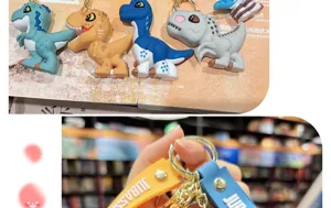 Joli porte-clés dinosaure en PVC 3D T-Rex dessin animé pendentif pour beau sac cadeau enfant