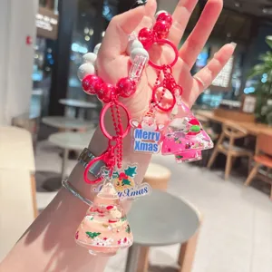 Cute Christmas tree quicksand keychain and beaded bag charm for autumn and winter decor.