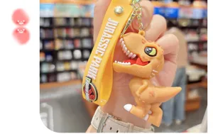 Mignon porte-clés dinosaure dessin animé tyrannosaure rex pendentif sac accessoire cadeau