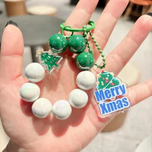Cute Christmas tree beaded keychain with iridescent white and green acrylic charms for bags.