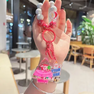 Christmas beaded liquid quicksand Christmas tree keychain cute acrylic bag pendant.
