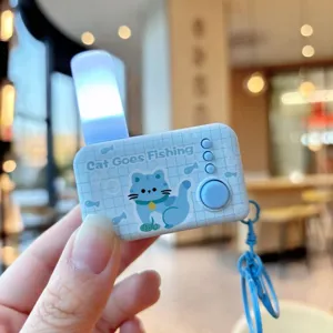Portable glowing cat decompression keychain light, cute cartoon style student bag pendant.