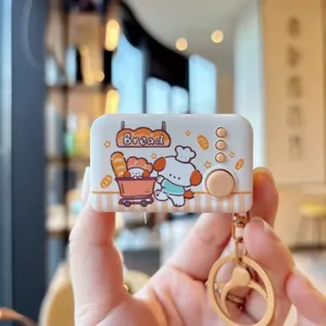 Cute cartoon decompression jump light keychain detail, portable stress relief toy pendant.