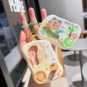 Cute mini cartoon water game console keychain toy, lovely creative gift for students bags.