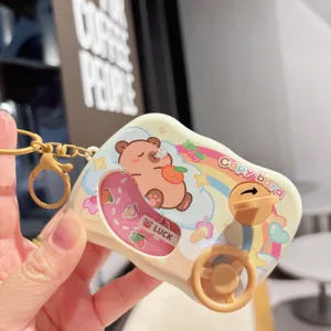 Detailed view of the cute capybara water game keychain toy, portable cartoon design.