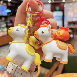 Cute cartoon horse keychain with fortune bag and gold ingot pendant, durable bag charm.