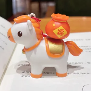 Cute cartoon horse keychain with fortune bag pendant, perfect accessory for bags and gifts.