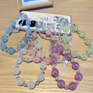 Colorful crystal beaded phone charm and cute bag keychain for women fashion accessories daily use.