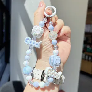 Cute macaron beaded phone chain with cute camera charms and letter beads, perfect phone accessory.