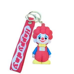 Portachiavi con clown di cartoni animati e cinturino rosa, ciondolo borsa e auto morbido.