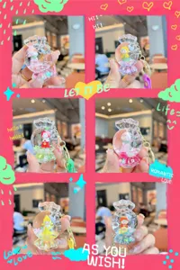 Cute acrylic quicksand candy keychain with liquid oil doll bag charm pendant for girls
