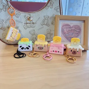 Adorable porte-clés en silicone grille-pain animal dessin animé et étui pour écouteurs chic.