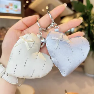 Korean style cute bow heart keychain bag charm, sweet aesthetic accessory for women and girls.