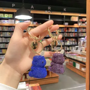 Dettaglio portachiavi unicorno in strass, ciondolo borsa in cristallo brillante per chiavi.