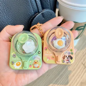 Mini pendentif créatif porte-clés machine à œufs au plat jouet de décompression sac