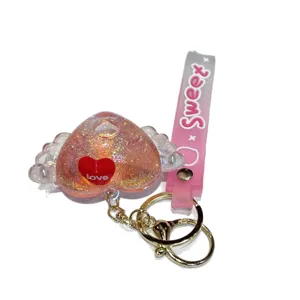 Creative liquid glitter floating heart keychain cute bag charm sweet gift for girls.