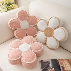 Plush flower pillow detail showcasing soft lamb wool texture and cute petal design.