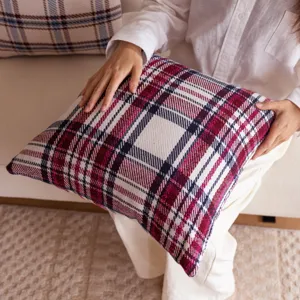 Cozy Christmas plaid sofa pillow cover, detailed view of soft cushion fabric in classic grid.