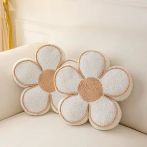 Cozy flower shaped plush pillow detail, soft cream and brown cushion texture for home decor