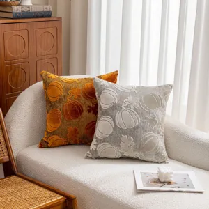 Detailed shot of Nordic style velvet pumpkin throw pillow cover with embossed autumn leaf patterns.