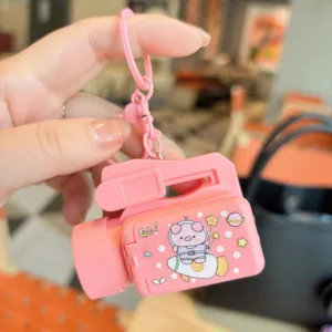 Pink cartoon camera projector keychain, cute pig astronaut pattern, mini portable toy.