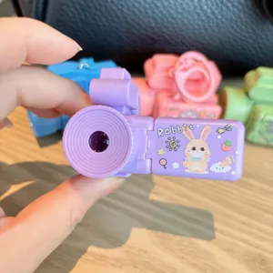 Cute cartoon camera projector keychain, fun decompression toy for kids and students.