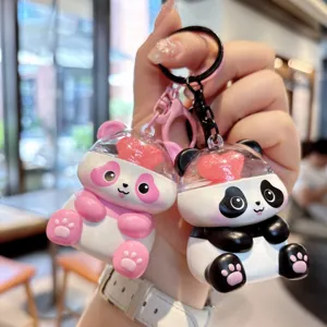 Cute couple panda keychain detail, magnetic design with heart accent for bag pendant