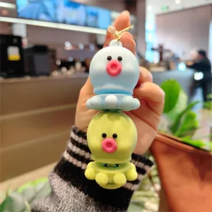 Detailed view of cute double stacked octopus squeeze toy keychain, soft silicone decompression pendant.