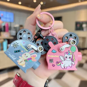 Schattige tekenfilm dier projector speelgoed sleutelhanger, creatieve tas hanger.