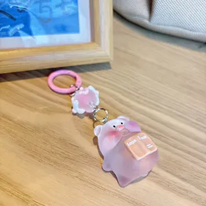 Simpatico portachiavi maialino rosa in resina, ciondolo borsa cartone animato dettaglio.