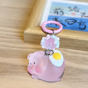 Portachiavi carino in resina con maialino rosa e uovo, ciondolo borsa per regalo ideale.