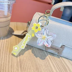 Creative liquid quicksand flower keychain, cute acrylic floating charm bag accessory gift.