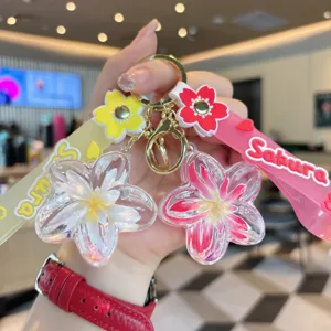 Creative oil filled plumeria flower keychain liquid quicksand bag pendant accessory gift