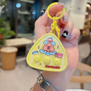 Cute cartoon capybara keychain mini retro audio pendant fun toy gift for kids and bags.
