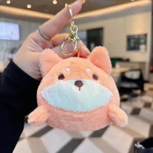Cute plush animal keychain detail view, soft fluffy dog plush toy pendant for keys bag charm.