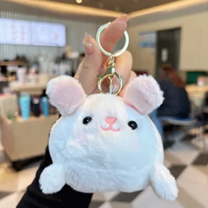 Cute plush animal keychain with soft round design, gold hardware for bags and keys.