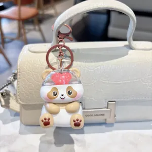 Cute cartoon luminous panda keychain detail shot, beautiful bag pendant and accessory.