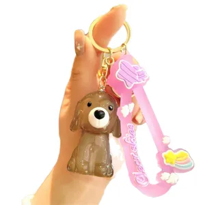 Porte-clés chiot acrylique avec sangle rose et joli pendentif arc-en-ciel pour sac.